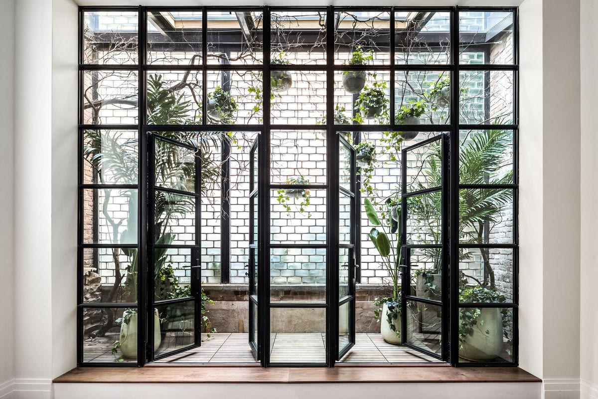 Dual french doors into terrarium