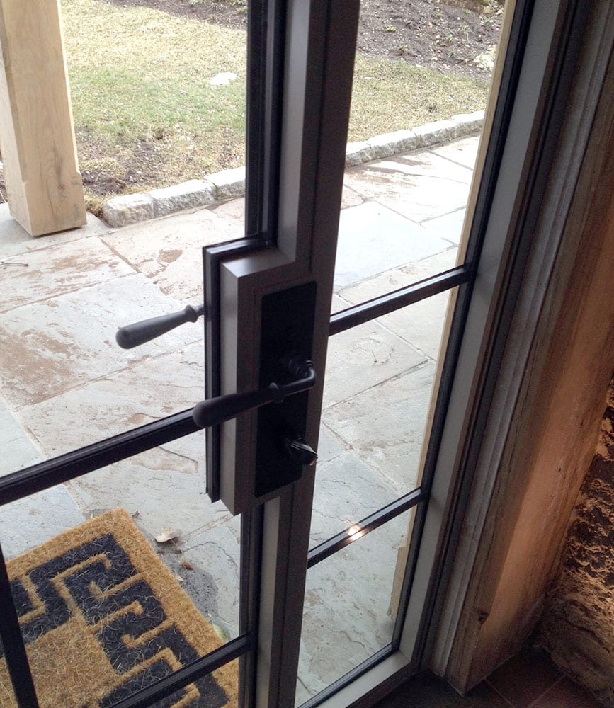 Lock box on steel hinged entry door